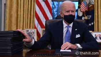 Biden signs first executive actions as president