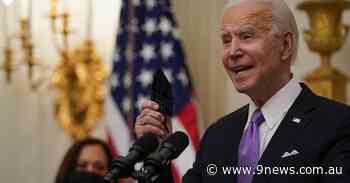 Biden signs burst of coronavirus orders, requires masks for travel and warns half a million could be dead by April - 9News
