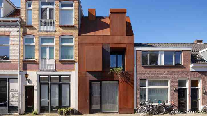 Zecc Architecten turns former garage into Corten-steel clad home in Utrecht