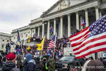 Nearly 1 in 5 of Capitol rioters charged so far served in the military, NPR reports