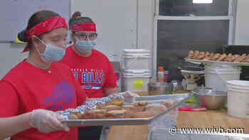 Students baking up some Buffalo Bills team spirit at Mazurek’s Bakery in the First Ward