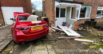 Man dies after car crashes into two houses in Bolton - Manchester Evening News