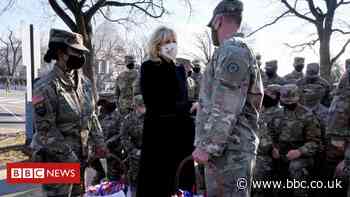 National Guard: President Biden apologises over troops sleeping in car park