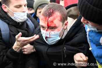 Tens of thousands of Alexei Navalny supporters take to the streets across Russia