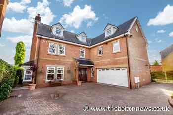 This Lostock house offers luxurious interiors and balcony views