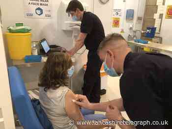 Firefighters help at mass vaccination hub in vaccine delivery