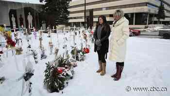 Rows of white crosses in downtown Sudbury, Ont., honour those lost to opioid crisis