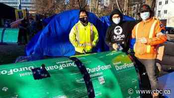'We all live in a city': Father-son pair of landscapers help build shelters in Toronto encampments