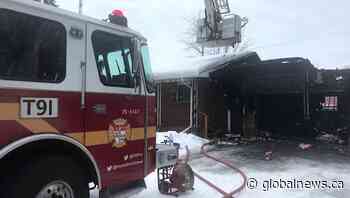 Ottawa man taken to hospital for burns after fire crews douse Metcalfe garage blaze - Global News