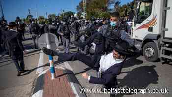 Israeli police clash with ultra-Orthodox protesters over school lockdown