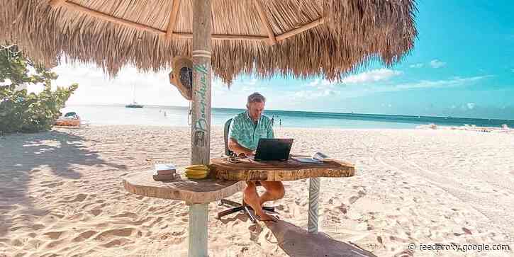 A hotel in Aruba is offering workstations on the beach for digital nomads - see the setup