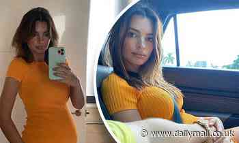 Emily Ratajkowski dons sunshine yellow dress while husband Sebastian Bear-McClard caress her tummy