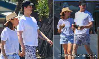 Kate Ritchie, 42, and her boyfriend John Bell, 25, get handsy in Byron Bay