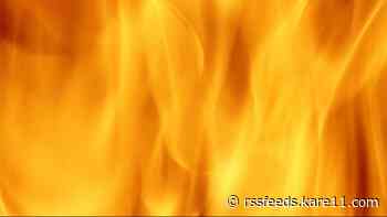 One dead, one arrested after structure fire in Le Center