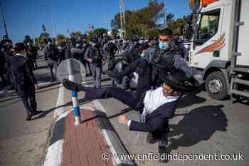 Israeli police clash with ultra-Orthodox protesters over school lockdown - Enfield Independent