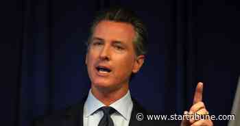 California lifts virus stay-at-home order and curfew