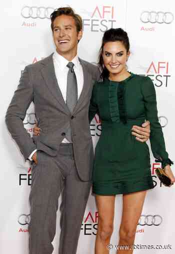 Elizabeth Chambers 'holding on for dear life' amid Armie Hammer's scandals