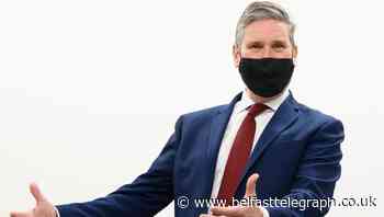Starmer says PM was consistently ‘behind the curve’ as Covid deaths pass 100,000