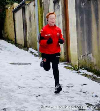 Young footballer Harrison Waite raises £600 for Darwen Food Larder