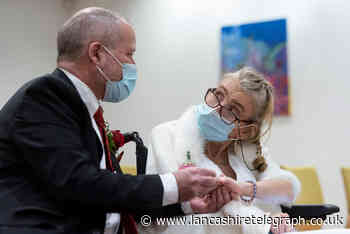 Bride battling life-limiting condition marries life-long sweetheart on 50th birthday