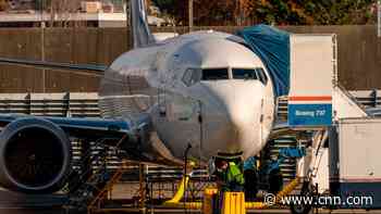 Facing back-to-back crises, Boeing posts a record loss
