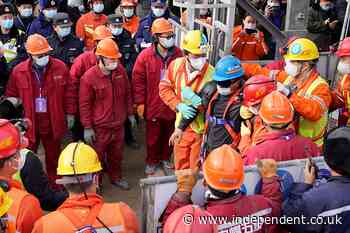 China miners rescued after knocking on pipe