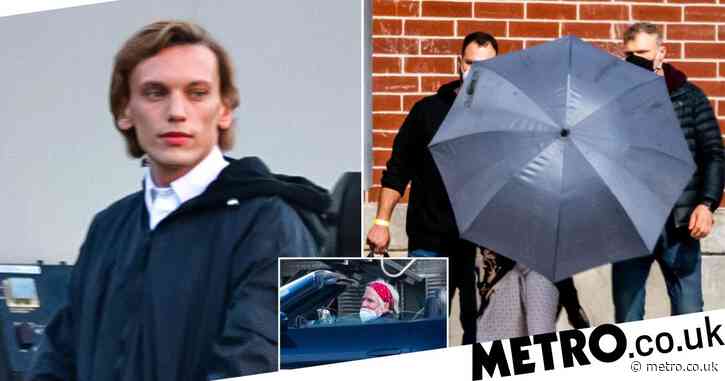 Millie Bobby Brown hides behind umbrella as she’s spotted in hospital gown on set of Stranger Things season 4