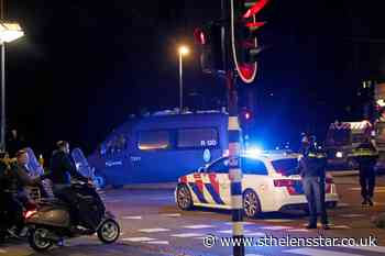 131 arrested on 'calmer' night during virus curfew in Netherlands - St Helens Star