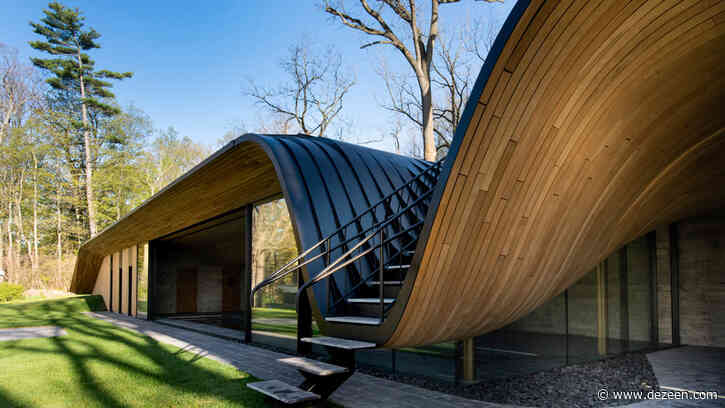 Partisans tops rebuilt pool house in Ontario with undulating timber roof