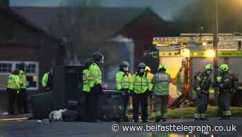 Patel and charities clash over fire at virus-hit barracks housing asylum seekers