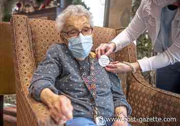 Seniors, longing for hugs and human touch, line up for COVID vaccine at Juniper Village