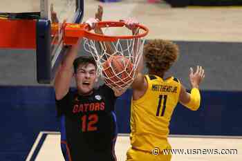 Florida Beats No. 11 WVU in Big 12-SEC Challenge 85-80