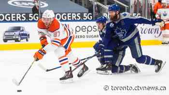 Connor McDavid scores a pair of goals in 4-3 overtime win for Oilers over Maple Leafs