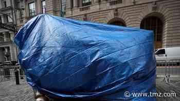 Wall Street's Charging Bull Covered in a Tarp, Fear of Attacks?