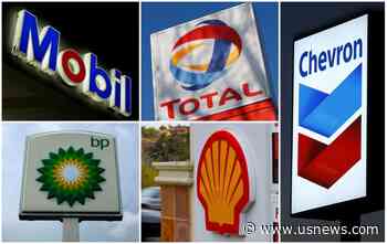 Exxon, Chevron CEOs Discussed Merger in Early 2020-Sources