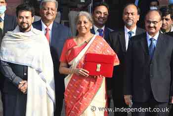 India doubles long-neglected healthcare spending and sets aside £3.5bn for Covid vaccines as it eyes recovery