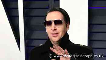 Marilyn Manson dropped by record label following abuse allegations