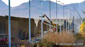 Biden asks high court to put off wall, asylum cases