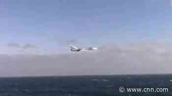 See Russian jet fly low near US Navy ship