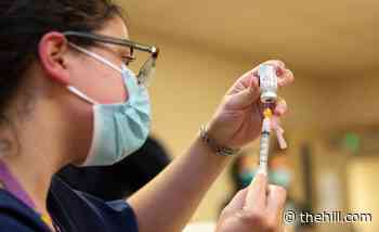 House Democrats press Biden over vaccine distribution for people of color