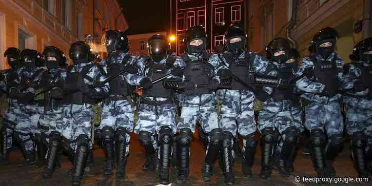 Riot gear-clad Russian police violently crackdown on peaceful protests over Navalny's prison sentence