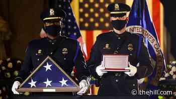 Capitol Police Officer Brian Sicknick lies in honor in Rotunda
