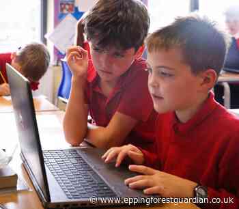 Debden Primary Academy donated laptops by Lowell - Epping Forest Guardian