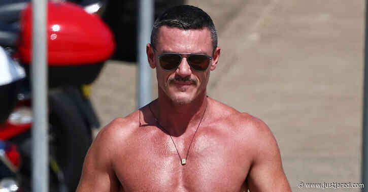 Luke Evans Shows Off New Leg Tattoo in Tiny Bathing Suit During Trip to the Beach!