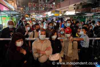 Hong Kong locks down entire residential blocks without warning to contain Covid outbreaks