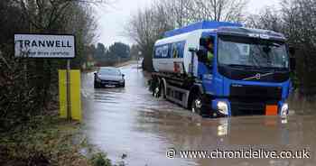Car abandoned on water-logged road as flooding hits Northumberland