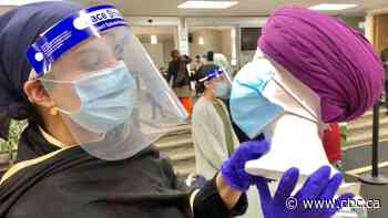 Sikh youth group helping South Asian seniors balance mask wearing with religious wear