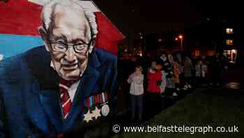 Belfast residents gather by mural portrait to applaud Captain Sir Tom Moore