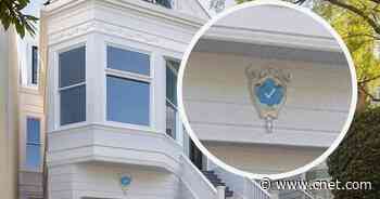 Life-size fake blue verified badge for home exteriors gets real takers     - CNET