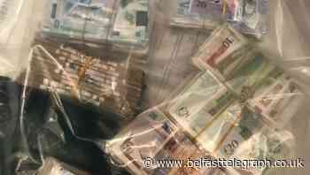 Man and woman charged after drugs and cash seized in Belfast - Belfast Telegraph